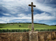 Vineyards-of-Domaine-Romanee-Conti-and-iconic-image-of-their-cross.jpg