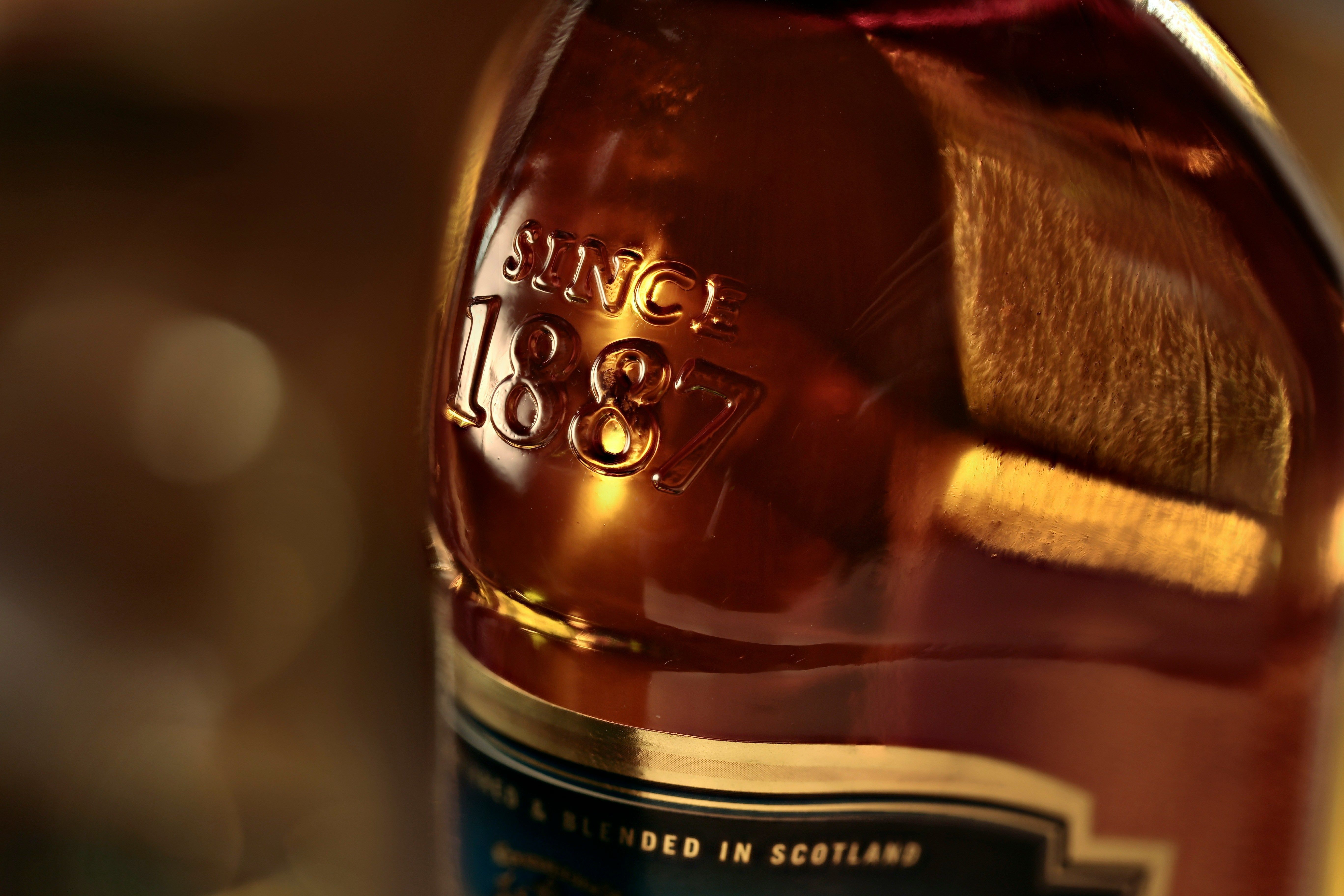 How do whisky and wine investments compare in 2024?